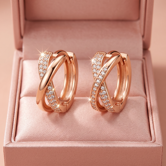 Roze gold ukrštene minđuše sa cirkonima u roze poklon kutiji