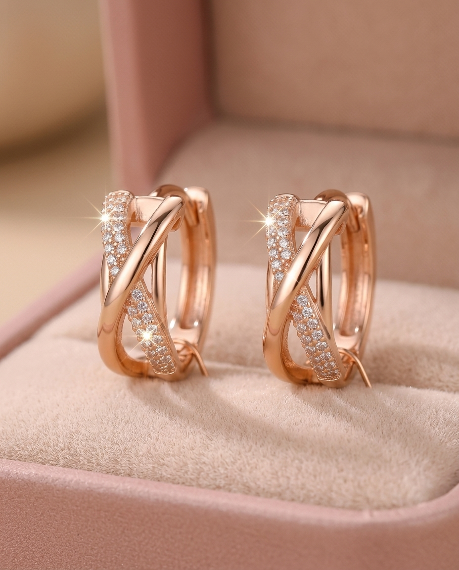Roze gold ukrštene minđuše sa cirkonima u roze poklon kutiji